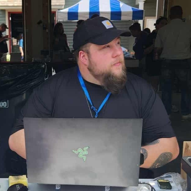Tom from Happy Hour Engraving at a craft fair