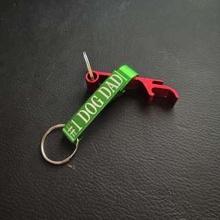 Personalized green and red bottle opener keychain engraved with number one dog dad